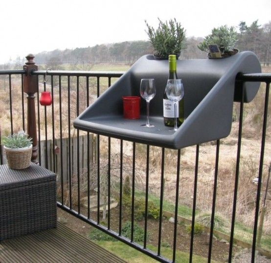 use fold-down tables in your balcony