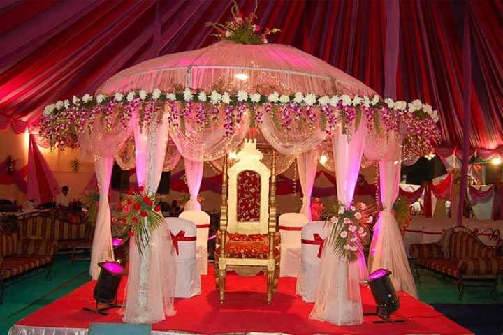 a dome-shaped floral stage