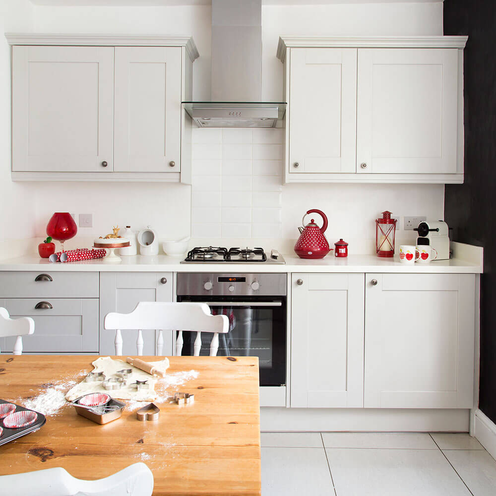 All White Kitchen With Vibrant Accents